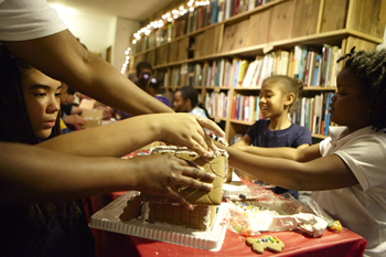 Rebuild Foundation kid making gingerbread house