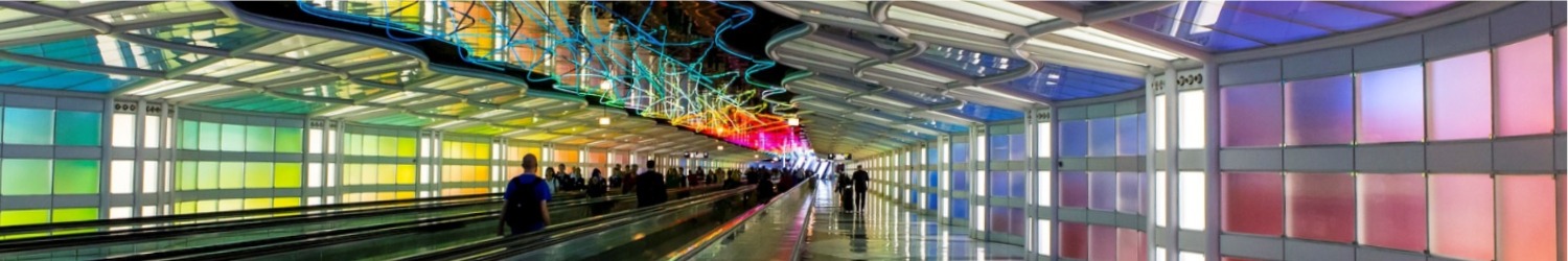 tunnel at O'Hare International Airport with lights and moving sidewalks