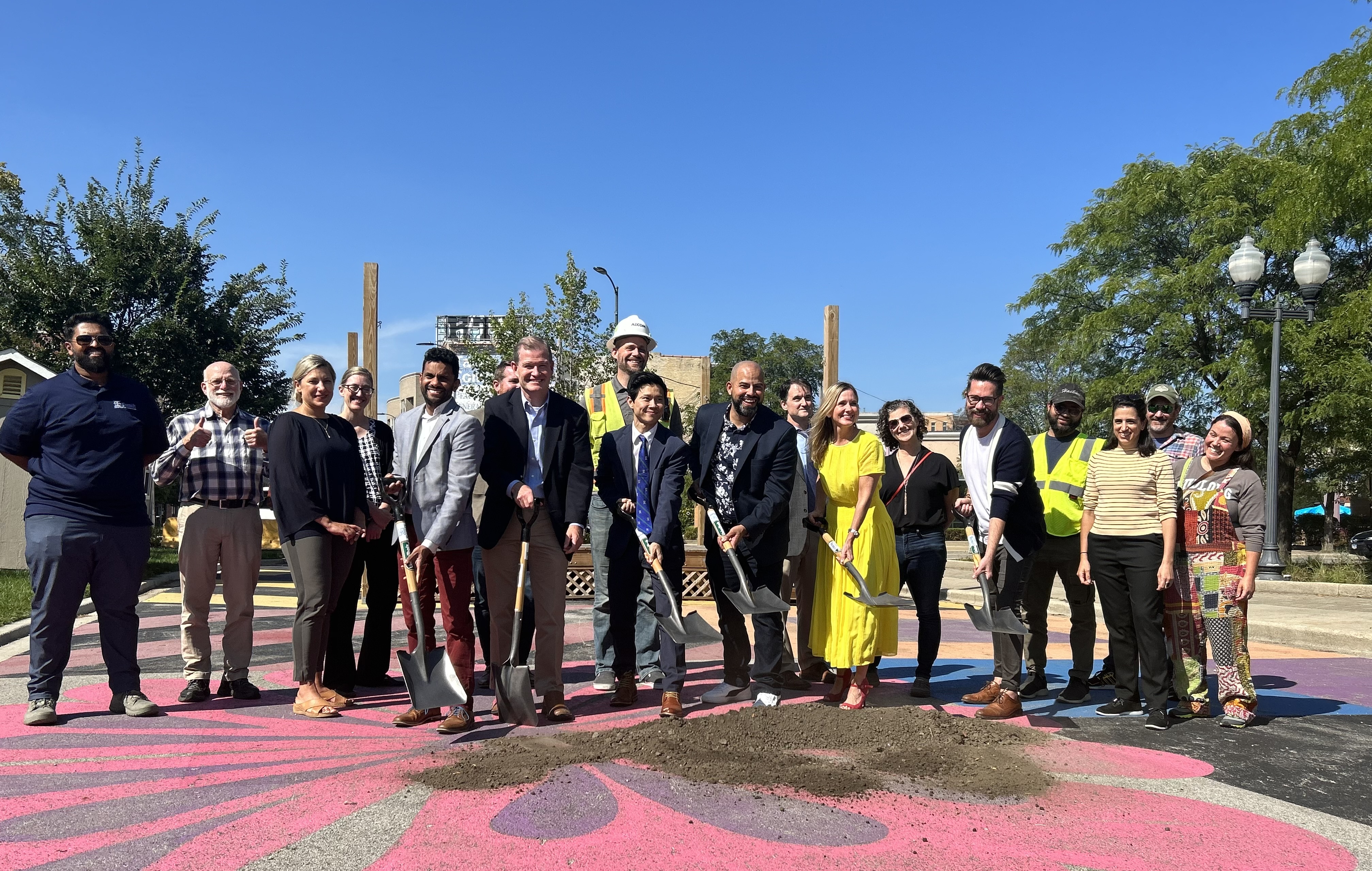 CDOT, Alderman and community leaders stand behind dirt and shovels to commemorate the start of construction for the Lincoln Ave Streetscape 