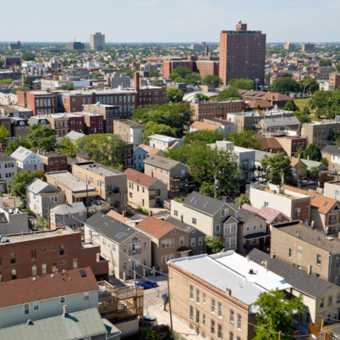 CDPH Intro Pic - Community Environment Information Chicago neighborhoods with skyline in background, aerial view