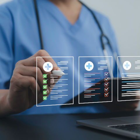 Doctor managing digital health records