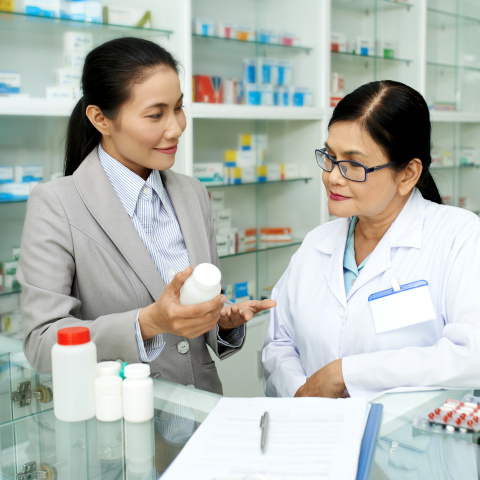 Pharma rep with pharmacist