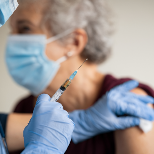 Vaccines for Older Adults elderly woman receiving immunization