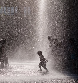 Kids play in the Crown Fountain (Photo credit: Ken Tanaka)