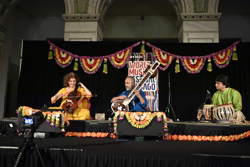 World Music Festival Chicago (Three performers sitting on stage at the Chicago Cultural Center)