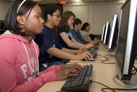 Picture of students working in a computer lab