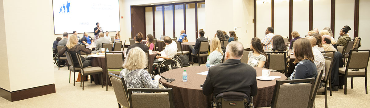 Group of people at an event in the training room