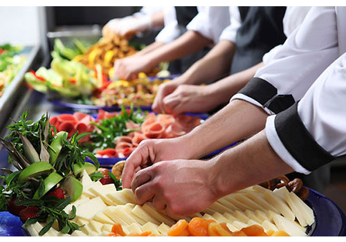 Cooks working in a restaurant kitchen