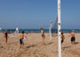 People playing volley ball at the beach