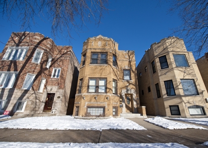 Chicago houses with snow on the lawn