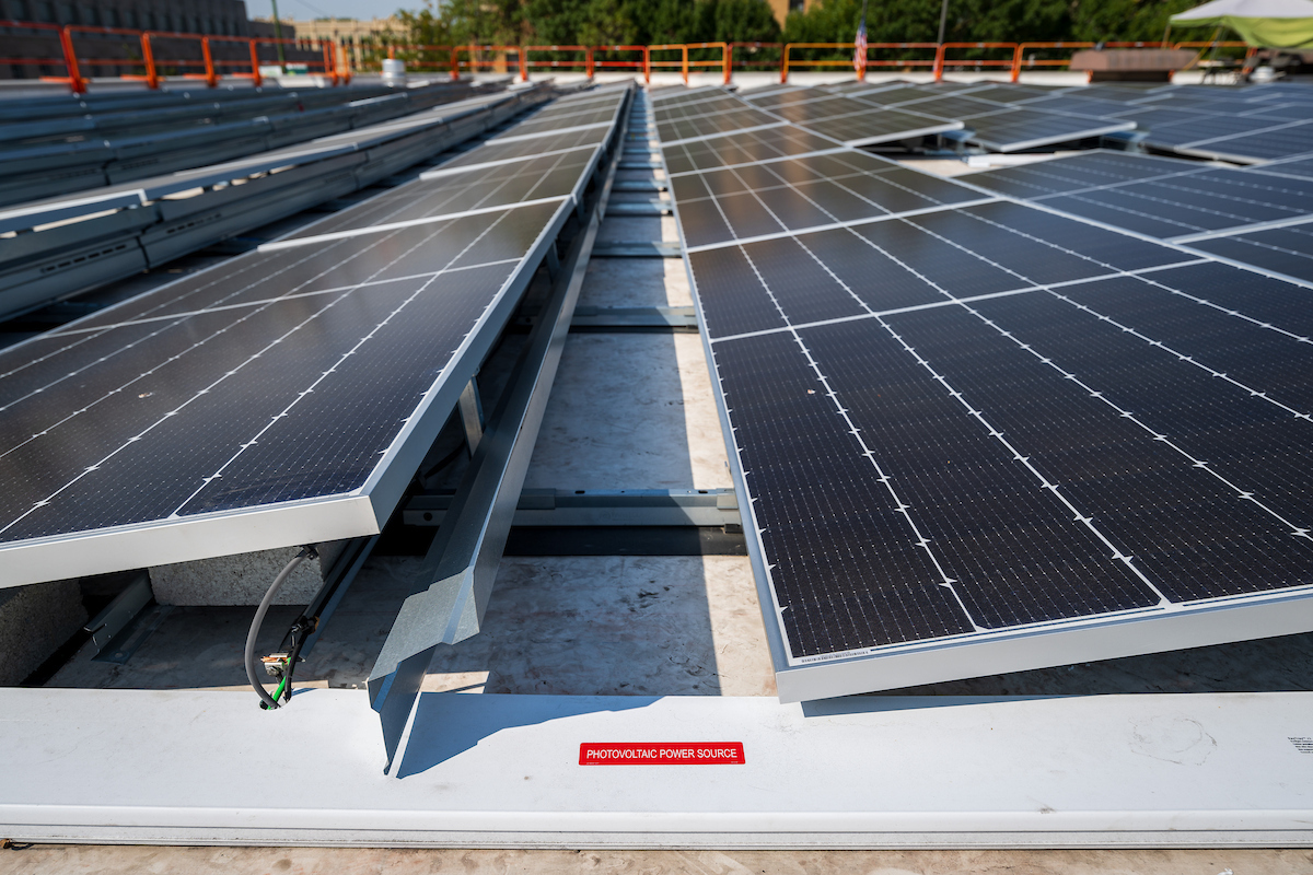 Side view of solar panels being installed on the roof of the Humboldt Park Branch Library in Chicago's Humboldt Park neighborhood.