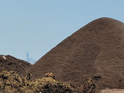 At the Harbor View Composting Facility, the food waste is mixed with yard waste, placed in long windrows, and processed into compost over the course of about 3 months.