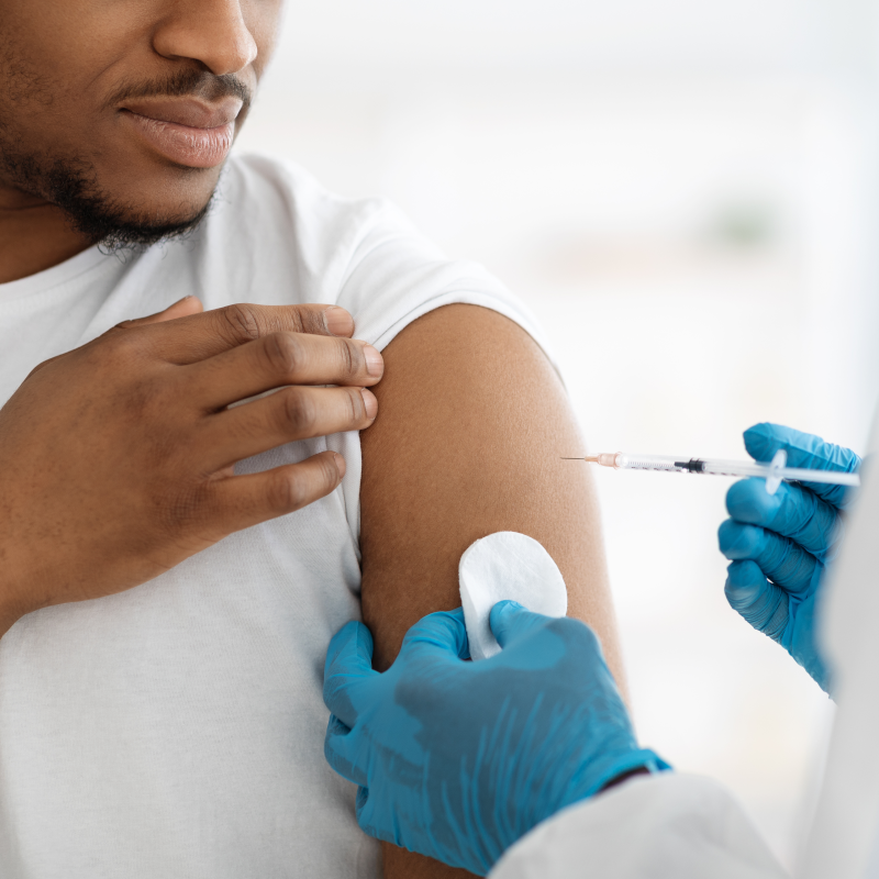 person receiving vaccination person receiving vaccination