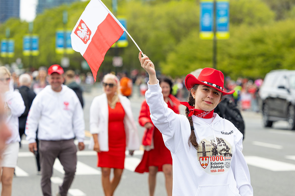 Girl holding poish flag