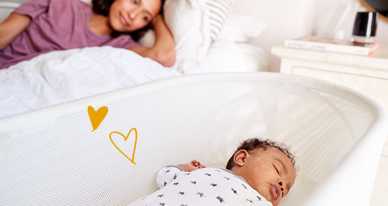 Sleeping Infant with mother watching