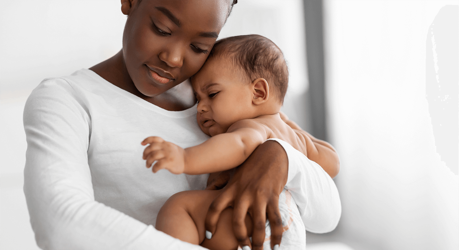 Adult female holding infant